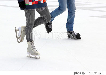 foot ice-skating person on the ice rink foot ice-skating person on the ice rink 71194075
