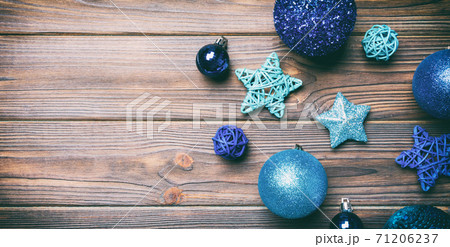 Creative set Banner of New Year baubles and decorations on wooden background. Top view of Christmas time concept. Copy space Creative set Banner of New Year baubles and decorations on wooden background. Top view of Christmas time concept. Copy space 71206237