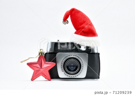 Old-fashioned Camera and New Year. Old-fashioned Camera and New Year. 71209239