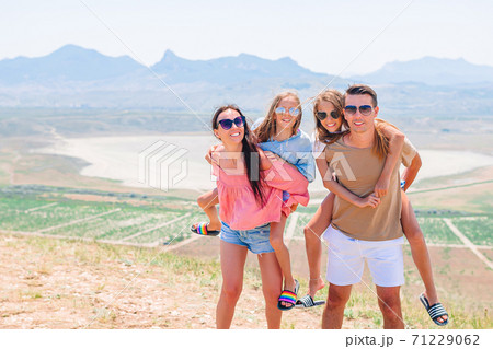 Happy family on vacation in the mountains Happy family on vacation in the mountains 71229062