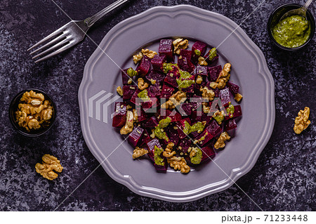 Beetroot, pesto sauce and walnut salad 71233448