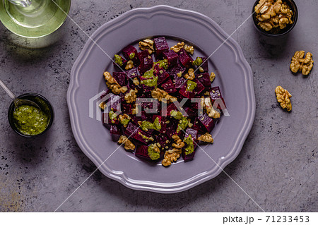 Beetroot, pesto sauce and walnut salad 71233453