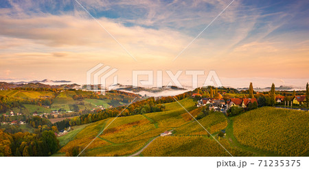 South styria vineyards landscape, near Gamlitz, Grape hills view from wine road in autumn. 71235375