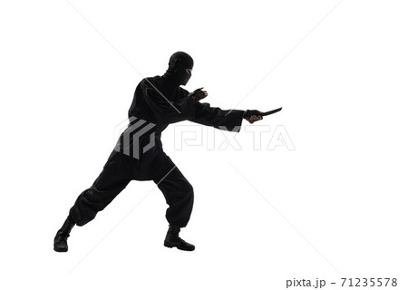 japanese ninja in black uniform on white background 71235578
