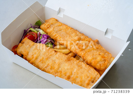 Cardboard boxes with hot food to go. Food delivery Cardboard boxes with hot food to go. Food delivery 71238339