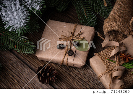 Christmas gift boxes in craft paper Christmas gift boxes in craft paper 71243269