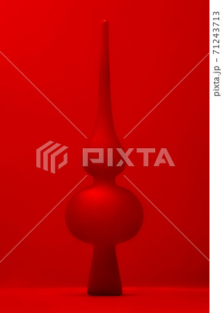 New Year's toy on top pine on a red background 71243713
