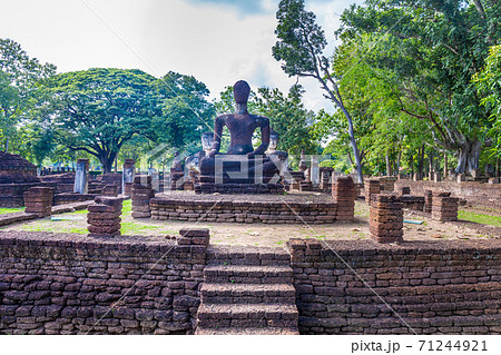 Landmark of Buddha image made of ancient bricks in the Kamphaeng Phet Historical Park, Thailand. Landmark of Buddha image made of ancient bricks in the Kamphaeng Phet Historical Park, Thailand. 71244921