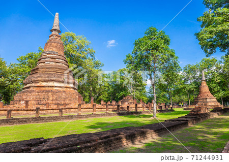 Landmark of old chedi made of ancient bricks in the Kamphaeng Phet Historical Park, Thailand.Landmark of old chedi made of ancient bricks in the Kamphaeng Phet Historical Park, Thailand. Landmark of old chedi made of ancient bricks in the Kamphaeng Phet Historical Park, Thailand.Landmark of old chedi made of ancient bricks in the Kamphaeng Phet Historical Park, Thailand. 71244931