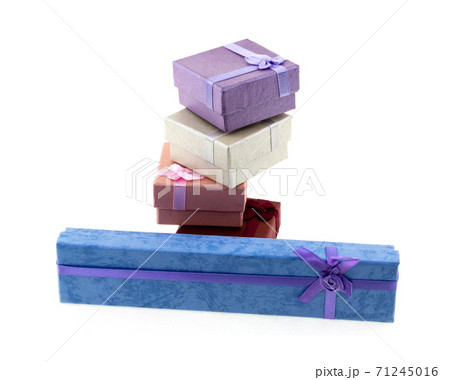 assorted gift box long blue and a stack of lilac and red box on an isolated background assorted gift box long blue and a stack of lilac and red box on an isolated background 71245016