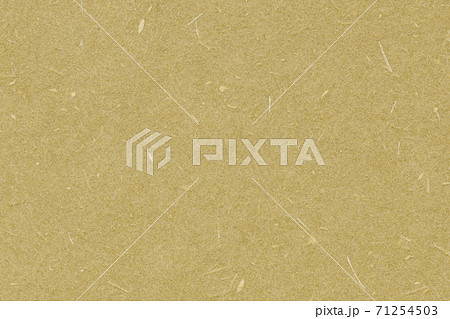 ざらざらナチュラルな黄土色の紙テクスチャの写真素材