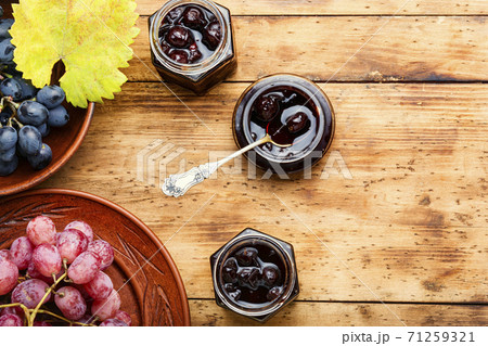 Jar of grape jam. Jar of grape jam. 71259321