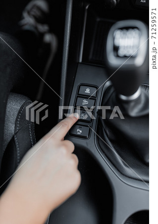 Acceleration system of a car with woman's hand 71259571
