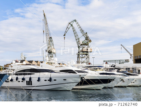 Port of Trogir, Croatia, with luxury boat parking and port cranes 71262740