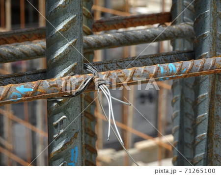 SEREMBAN, MALAYSIA -AUGUST 05, 2017: Steel reinforcement bar used to reinforced concrete at the construction site. It was tied together using tiny wires. SEREMBAN, MALAYSIA -AUGUST 05, 2017: Steel reinforcement bar used to reinforced concrete at the construction site. It was tied together using tiny wires. 71265100