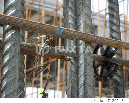 SEREMBAN, MALAYSIA -AUGUST 05, 2017: Steel reinforcement bar used to reinforced concrete at the construction site. It was tied together using tiny wires. SEREMBAN, MALAYSIA -AUGUST 05, 2017: Steel reinforcement bar used to reinforced concrete at the construction site. It was tied together using tiny wires. 71265124