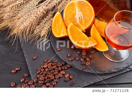 Top view coffee beans and glass of brandy. Top view coffee beans and glass of brandy. 71271126