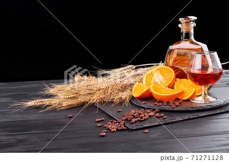 Still life whiskey with wheat and coffee beans. Still life whiskey with wheat and coffee beans. 71271128