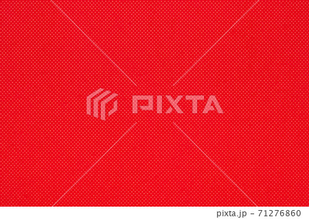 Background from red color texture of canvas non-woven fabric material in small rhombus. Close-up of abstract pattern backdrop 71276860
