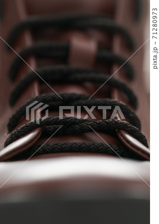 Closeup detail shot of brown leather sneaker 71280973