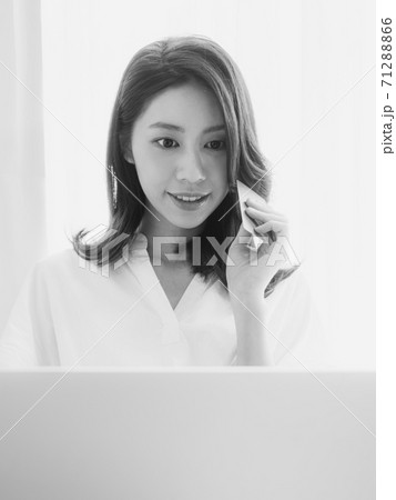 Young asian beauty shopping online with credit card and laptop Young asian beauty shopping online with credit card and laptop 71288866