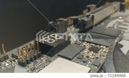 Motherboard close up photo with transistors Motherboard close up photo with transistors 71288906