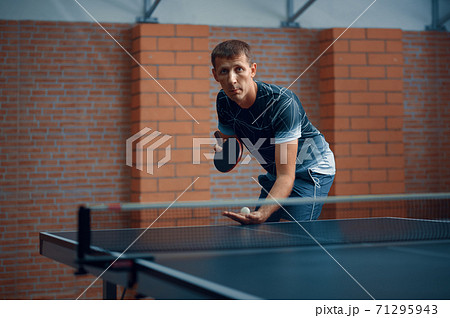 Man play table tennis, male ping pong player 71295943