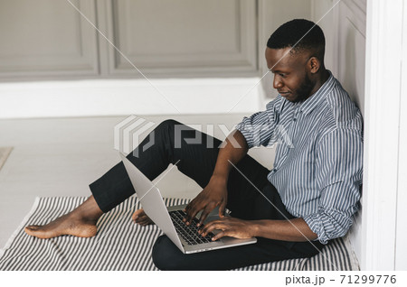 Male african american user hands typing on laptop keyboard sit at table, mixed race ethnic student professional study work with pc software technology concept, close up view Male african american user hands typing on laptop keyboard sit at table, mixed race ethnic student professional study work with pc software technology concept, close up view 71299776