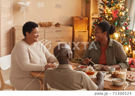 Happy African-American Family Enjoying Breakfast 71300524
