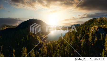 Aerial Panoramic View of Beautiful Glacier Lake in the Canadian Mountain Landscape Aerial Panoramic View of Beautiful Glacier Lake in the Canadian Mountain Landscape 71302194