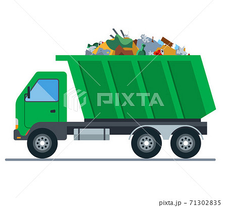 a truck loaded with garbage goes to a landfill. a truck loaded with garbage goes to a landfill. 71302835