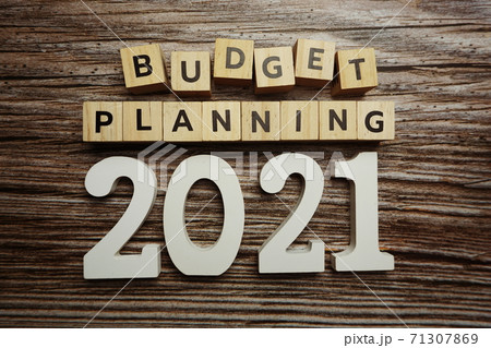 Budget Planning 2021 alphabet letters on wooden background Budget Planning 2021 alphabet letters on wooden background 71307869