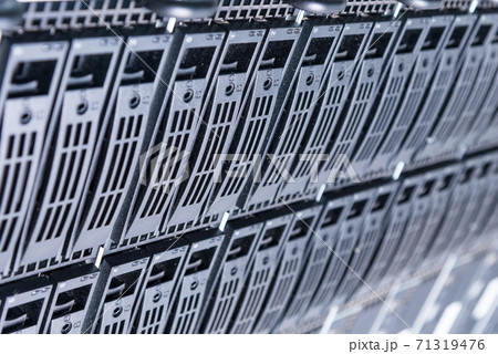 Cluster of data storage hard drives inside server room Cluster of data storage hard drives inside server room 71319476