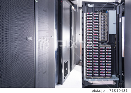 an opened door of data center cabinet filled with data storage h an opened door of data center cabinet filled with data storage h 71319481