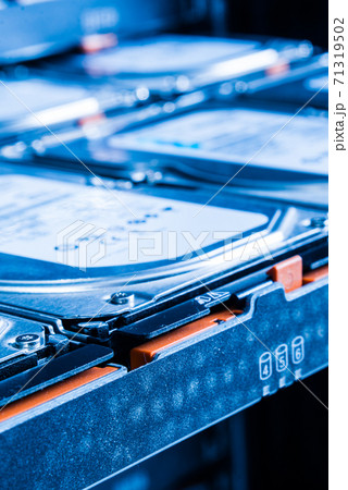 close up of hard disk drives inside hosting center 71319502