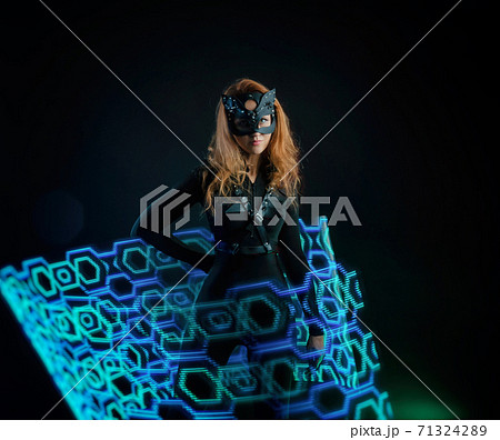 Pixel light show dancing girl in a cat costume for Halloween freezelight Pixel light show dancing girl in a cat costume for Halloween freezelight 71324289
