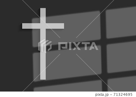 White Christian Cross on the wall background with window light and shadow. 71324695