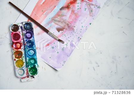Set of watercolor paints on white background. Brushes drawing. Creative background. School for teaching drawing. 71328636