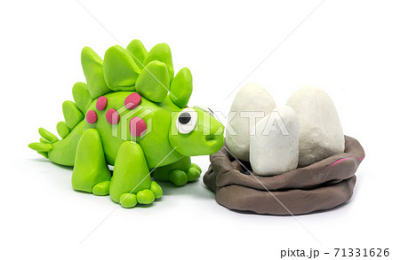 Play dough Stegosaurus on white background. Handmade clay plasticine 71331626