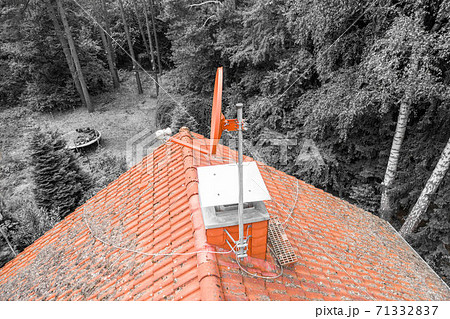 Flight over the red roof of a single family house Flight over the red roof of a single family house 71332837