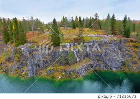 Marble canyon in Mining park Ruskeala at autumn Marble canyon in Mining park Ruskeala at autumn 71335673