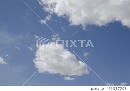 White clouds on a blue sky. Background. White clouds on a blue sky. Background. 71337293