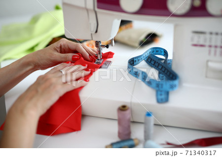 Blue measure tape on equipment 71340317