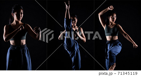 TaeKwonDo Karate teenager athlete kick punch black background isolated 71345119