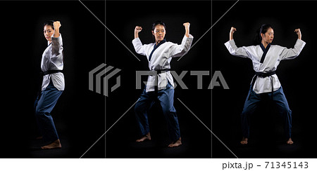 TaeKwonDo Karate teenager athlete kick punch black background isolated TaeKwonDo Karate teenager athlete kick punch black background isolated 71345143