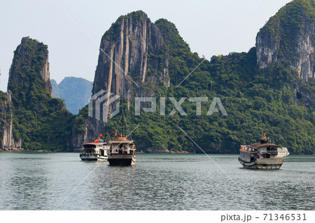 Rock islands near floating village in Halong Bay. Beautiful sea landscape in Ha Long Bay Vietnam Rock islands near floating village in Halong Bay. Beautiful sea landscape in Ha Long Bay Vietnam 71346531