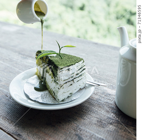 green tea cheese cake dessert on wood 71346595