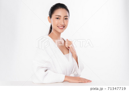Beautiful young asian woman with clean fresh skin on white background, Face care, Facial treatment, 71347719