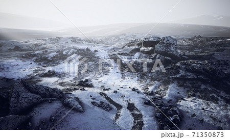 Antarctic mountains with snow in fog 71350873
