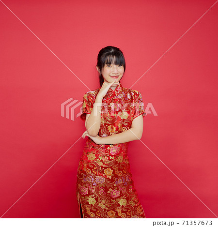 Asian woman wear Chinese dress with action 71357673